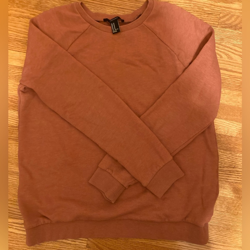 pinkish crewneck